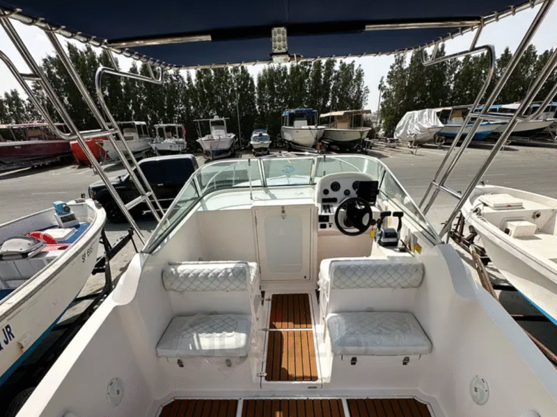 Family and fishing boat