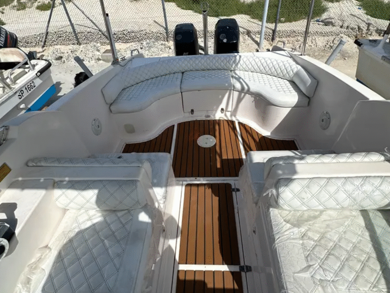 Family and fishing boat