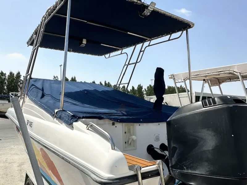 Family and fishing boat