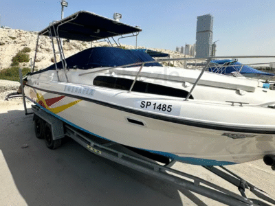 Family and fishing boat