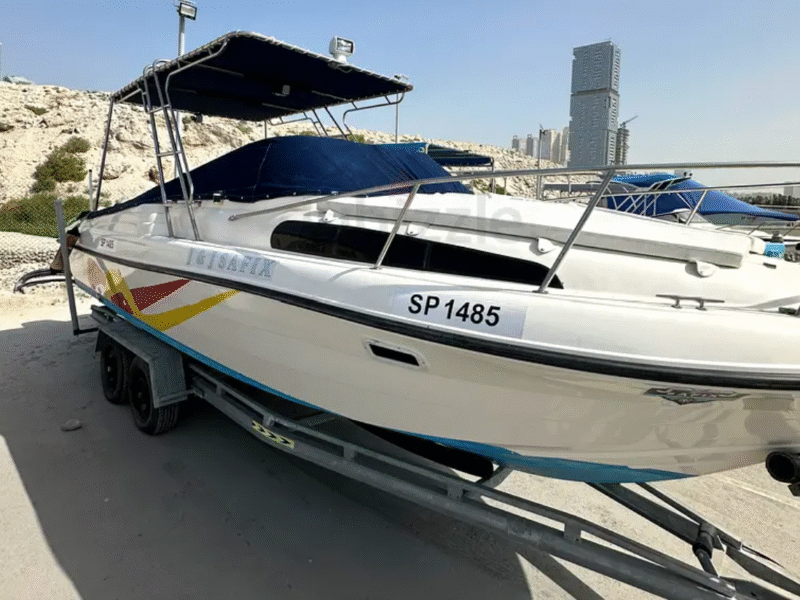 Family and fishing boat