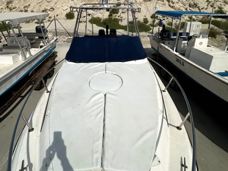 Family and fishing boat
